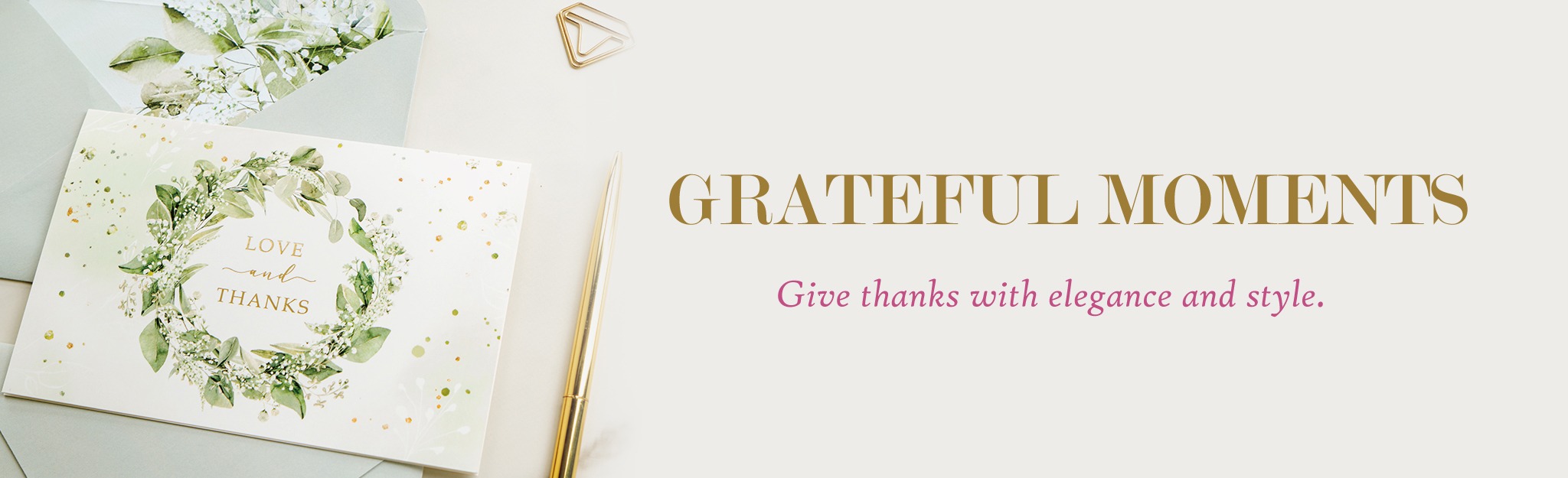 a pen and a greeting card